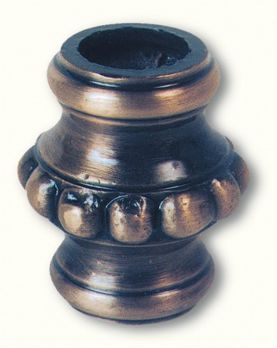 Garniture en laiton moulurée, polie et vernie pour barreaux de section Ø16mm. Hauteur de 45mm et largeur de 38mm.